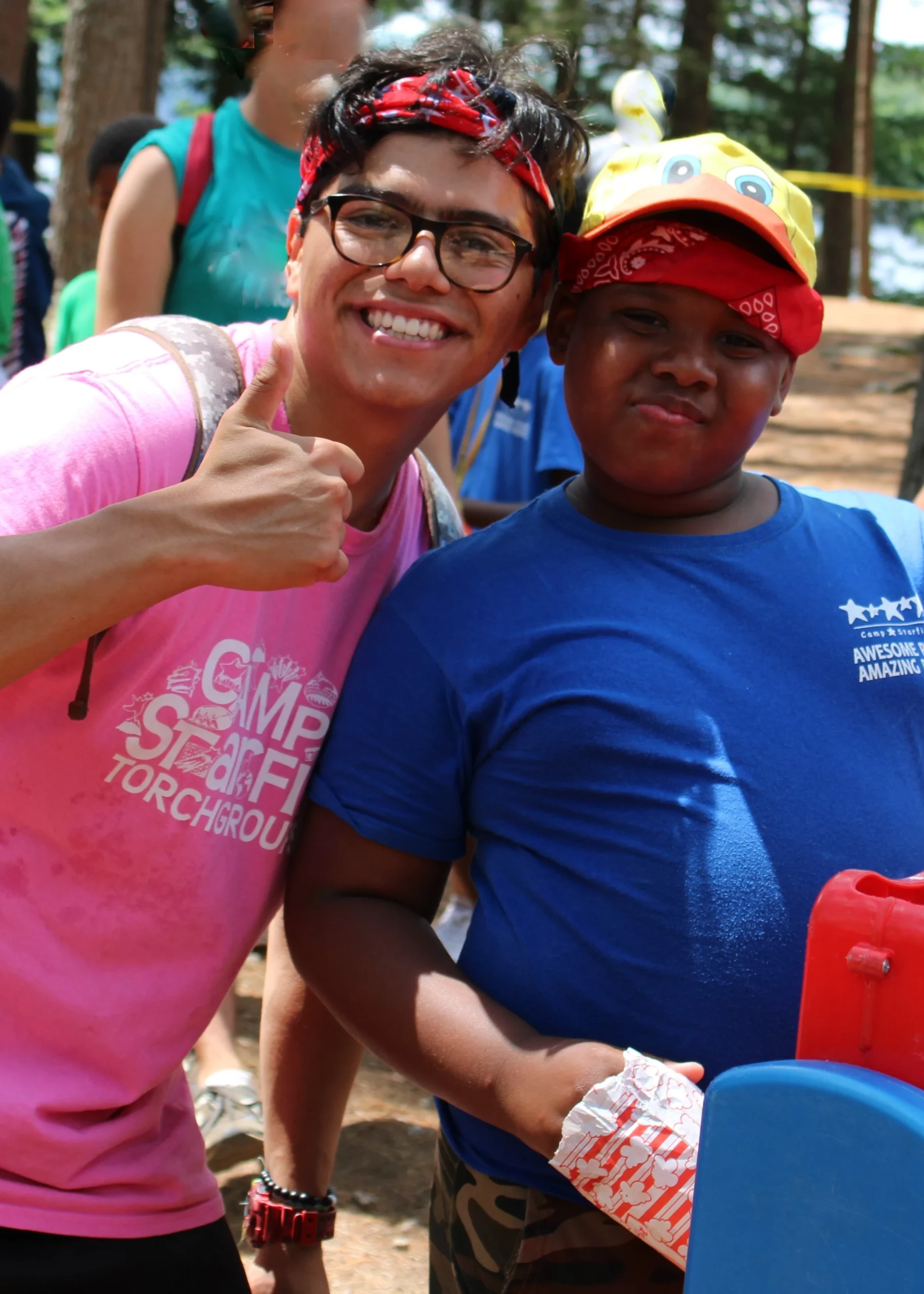 Smiling camper and counselor at Camp Starfish