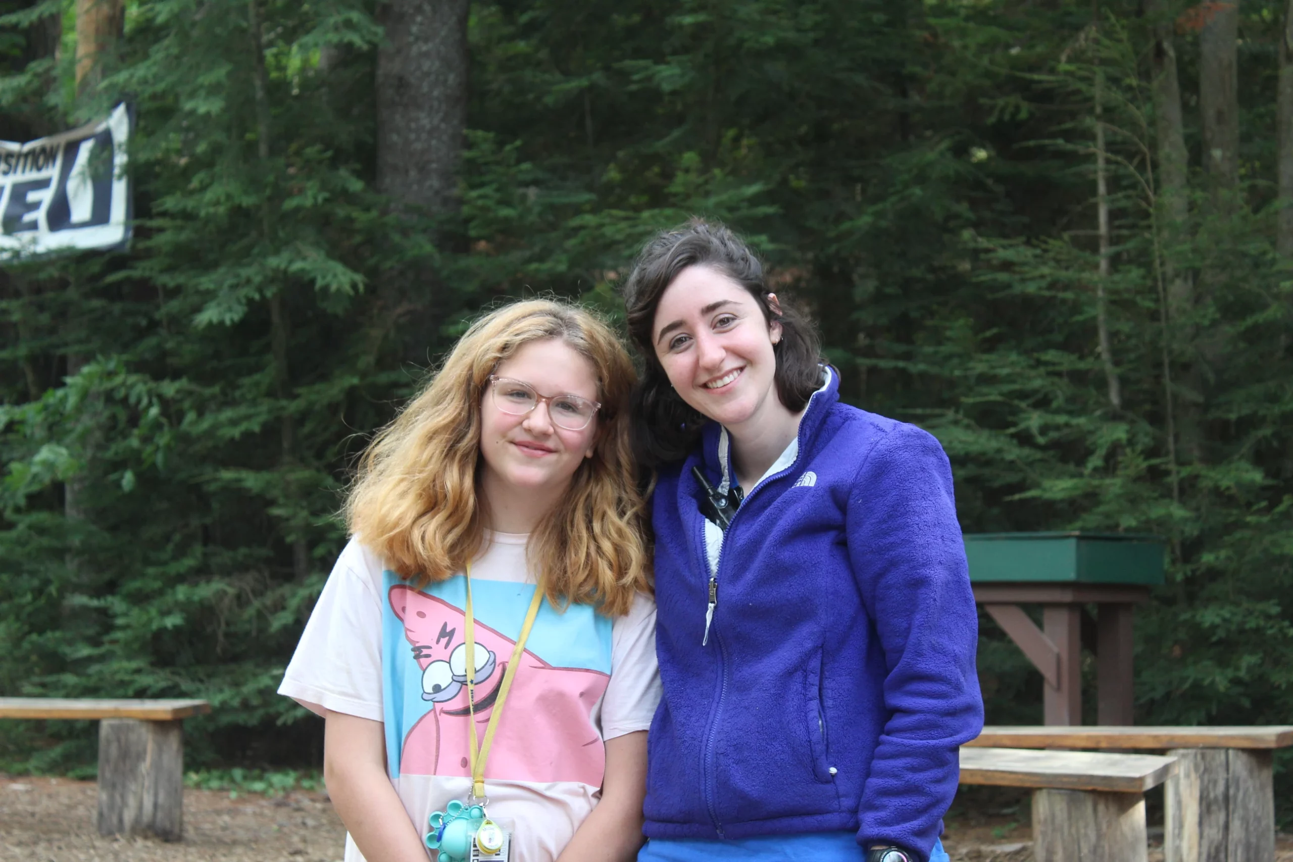 2 Smiling camper teen and counselor at Camp Starfish