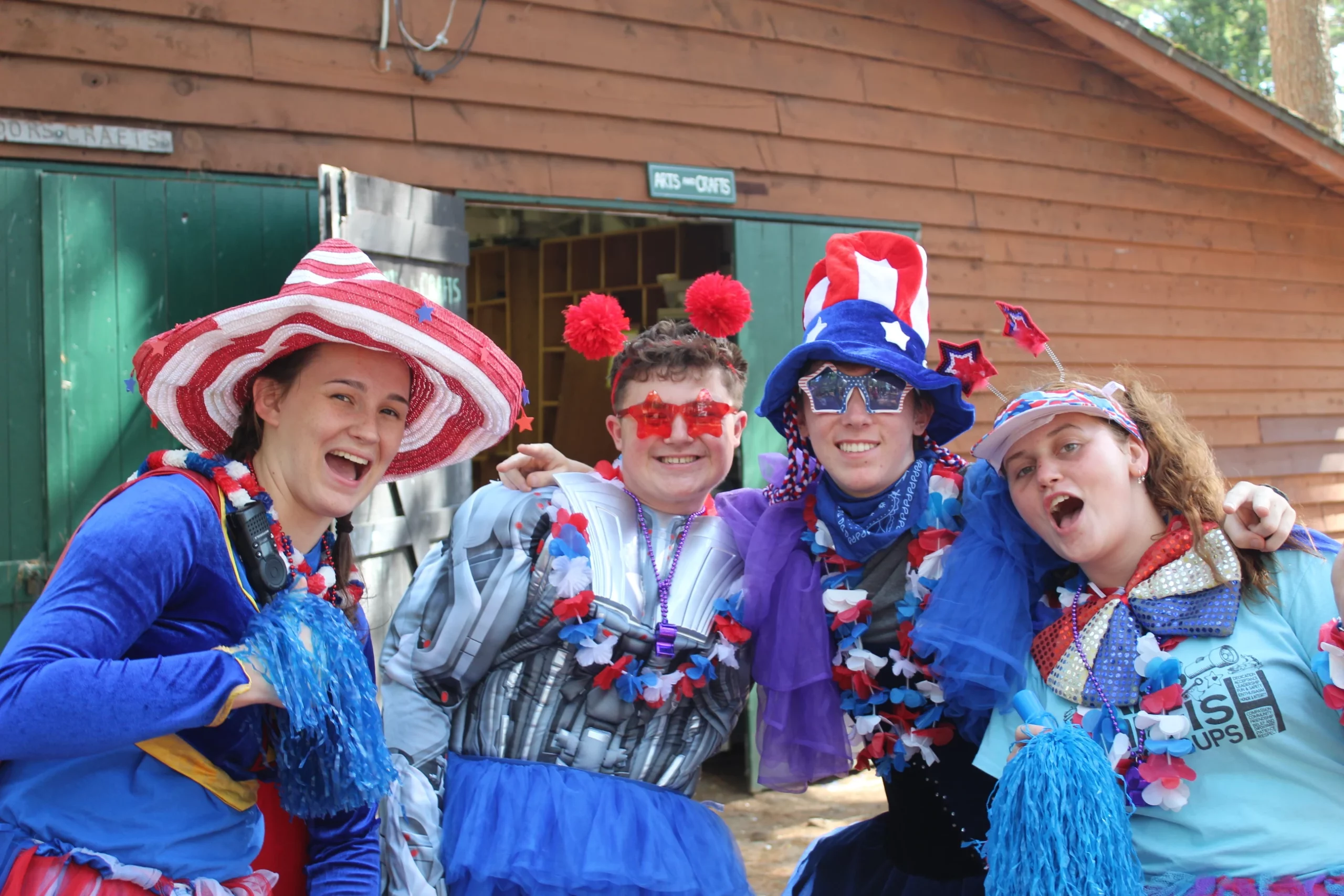 Campers wearing silly outfits and smiling at Camp Starfish