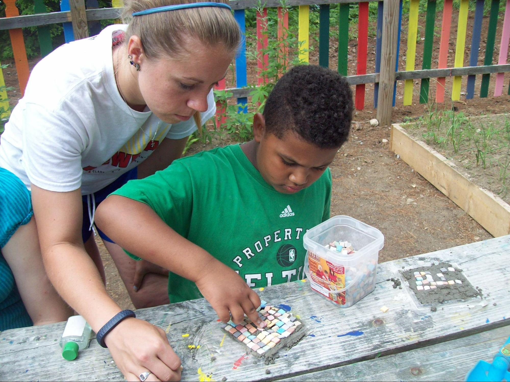 Two campers doing activities at camp starfish