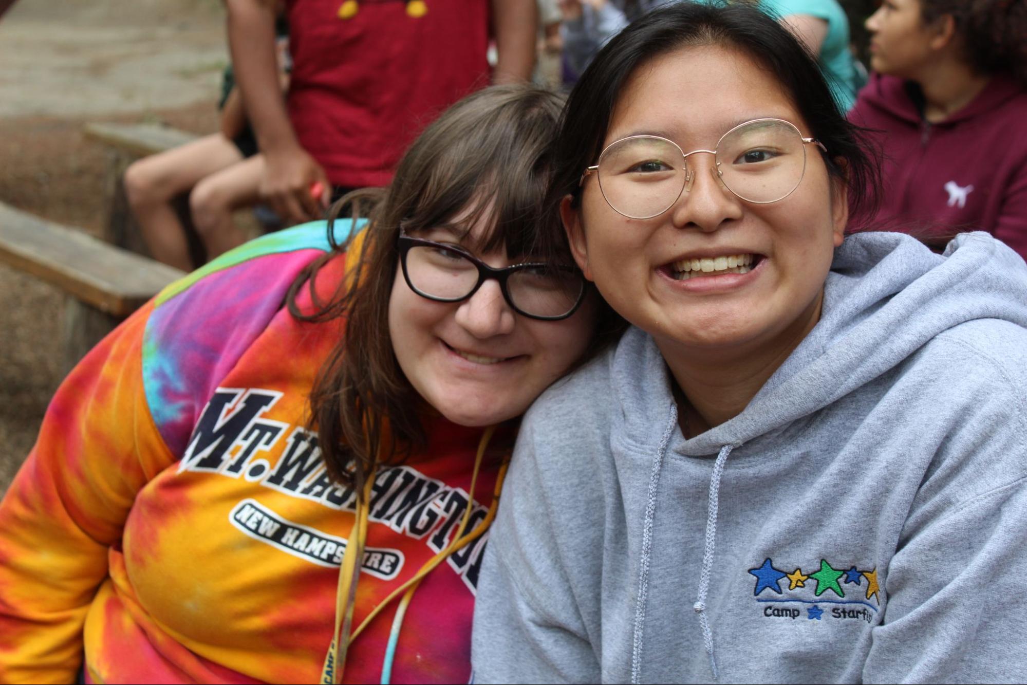 Smiling Camp Counselor and camper teen at Camp Starfish