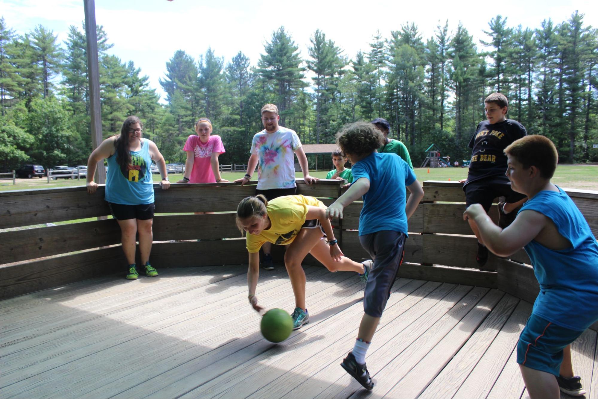 Group of teens playing dodgeball at Camp Starfish